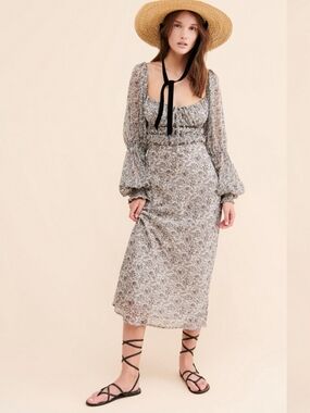 Smocked Neck Long Sleeve Floral Free People Midi Dress in Black and White